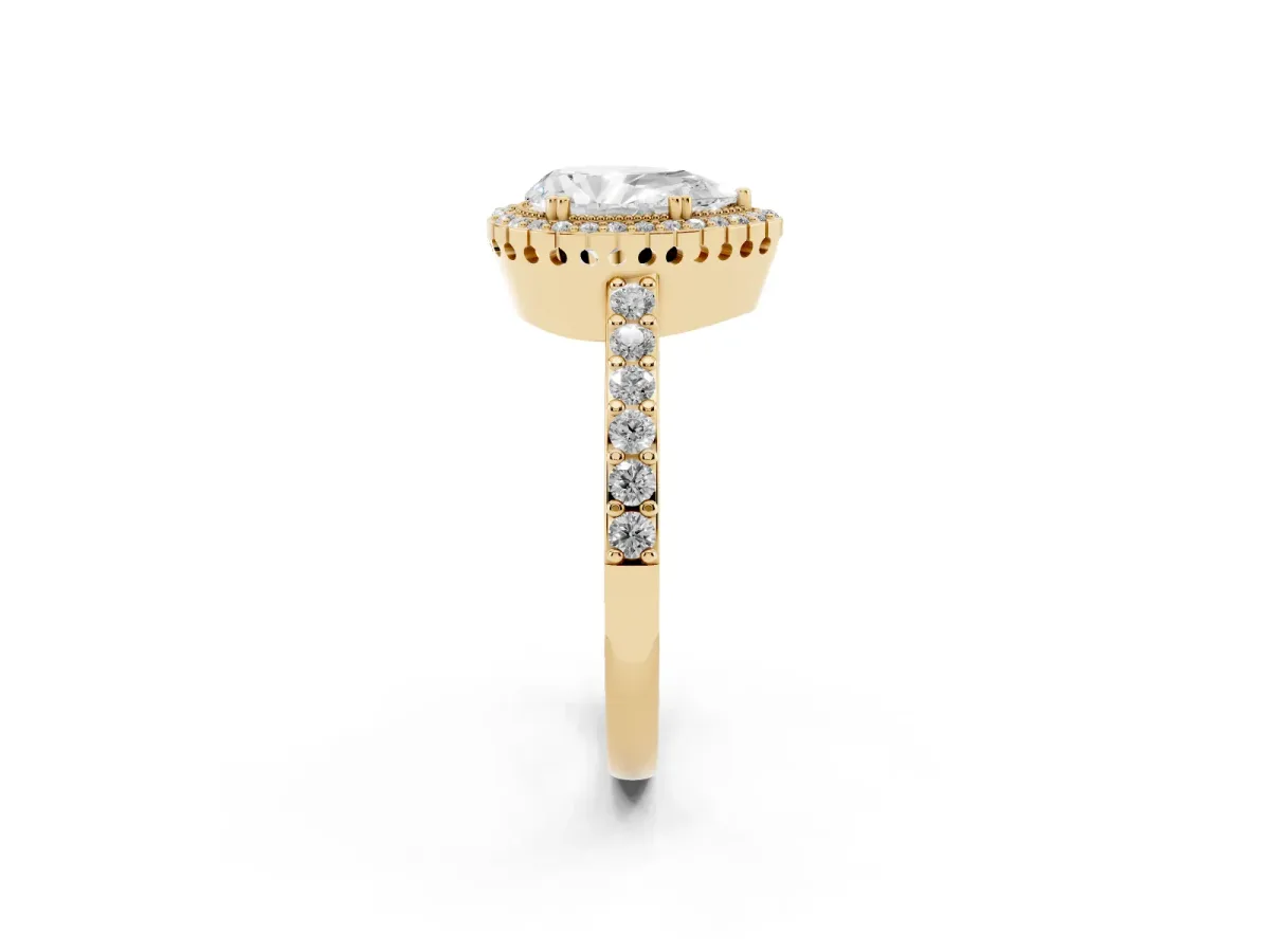 Pear Cut Cut Diamond Halo Engagement Ring with Milgrain Detail and Pavé Band Yellow gold