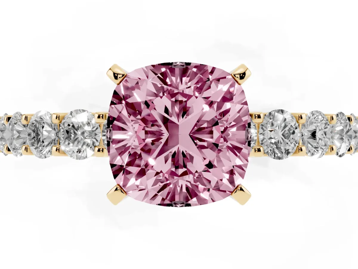 Fancy Pink Cushion Cut Diamond Solitaire Ring with Shared Prong Pavé Band and Four-Prong Setting Yellow gold