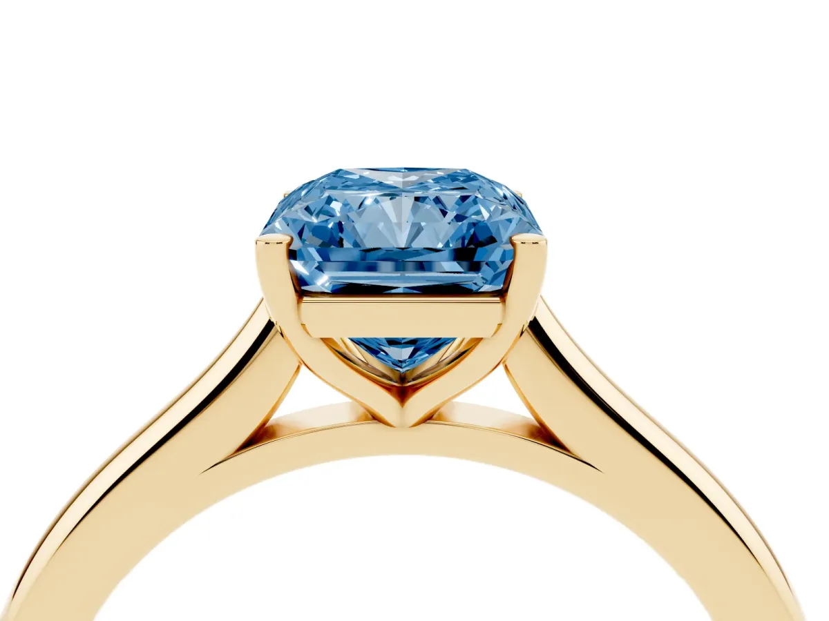 Fancy Blue Radiant Cut Cut Solitaire Ring with Cathedral Band and Four-Prong Setting Yellow gold
