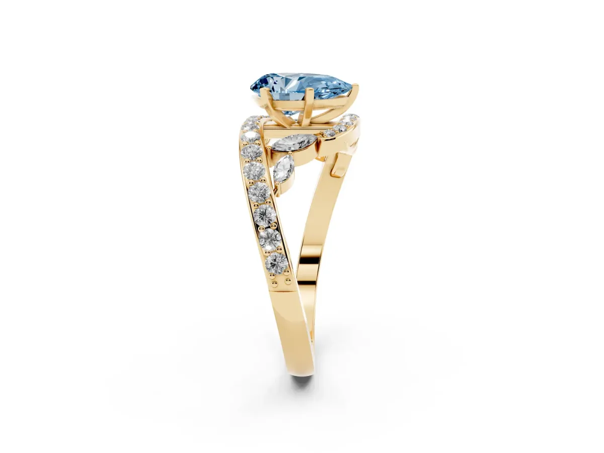 Fancy Blue Pear Cut Solitaire with Pavé Twist Band and Four-Prong Setting Yellow gold