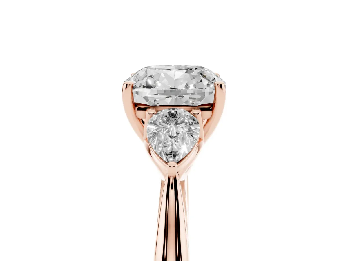 Three-Stone Cushion Cut Brilliant Diamond Solitaire Ring with Tapered Band and Four-Prong Setting Rose gold