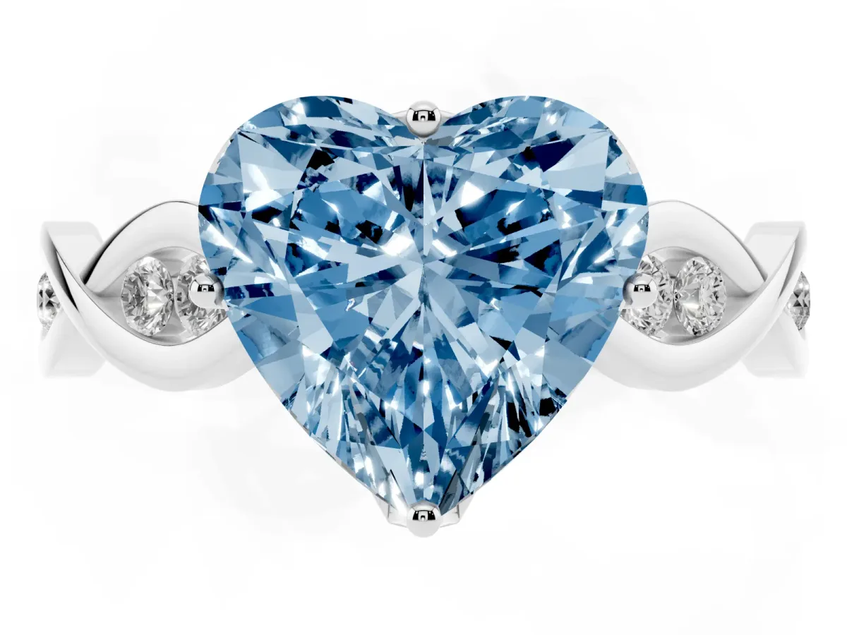 Fancy Blue Heart Cut Solitaire Twist Band with Leaf Prong Setting Platinum