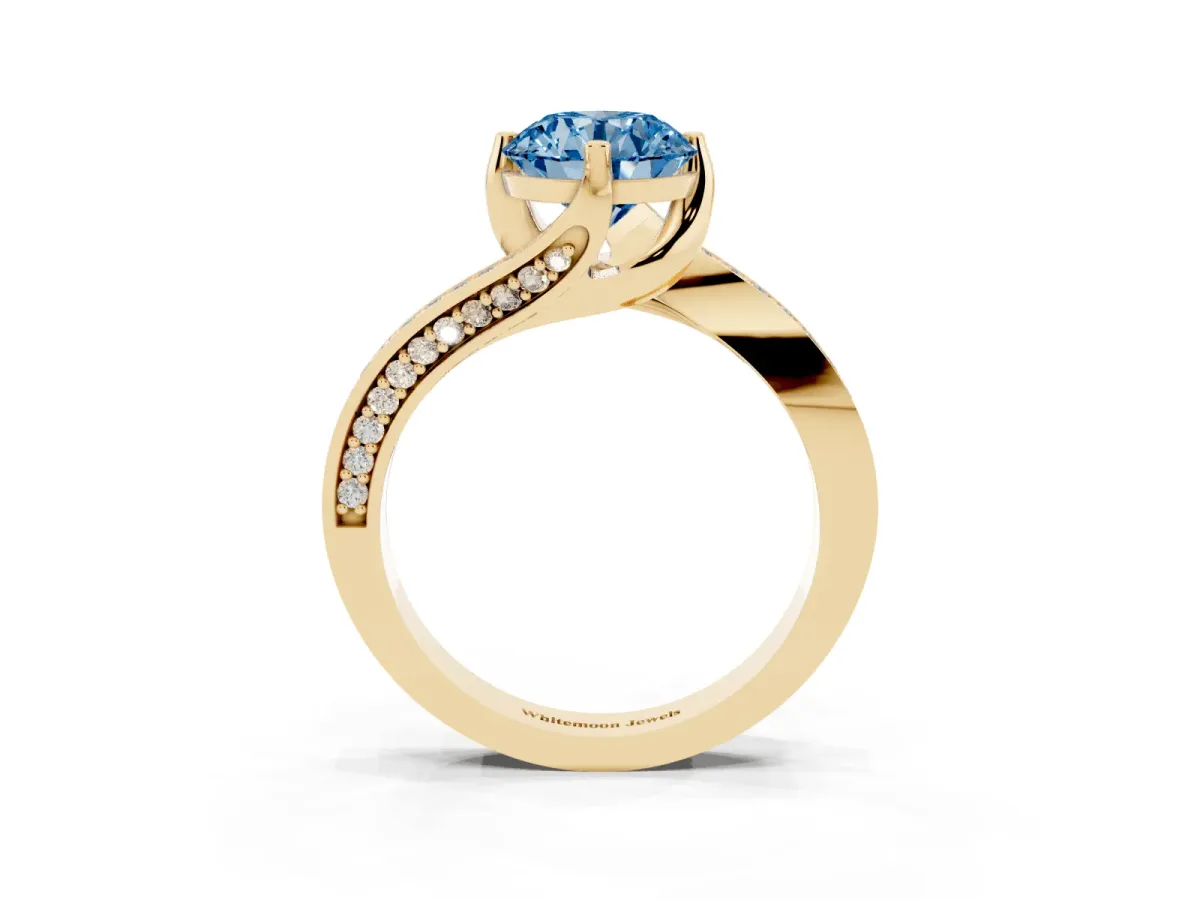 Fancy Blue Round Cut Solitaire Diamond Twist Band with Pavé Setting and Four-Prong Setting Yellow gold