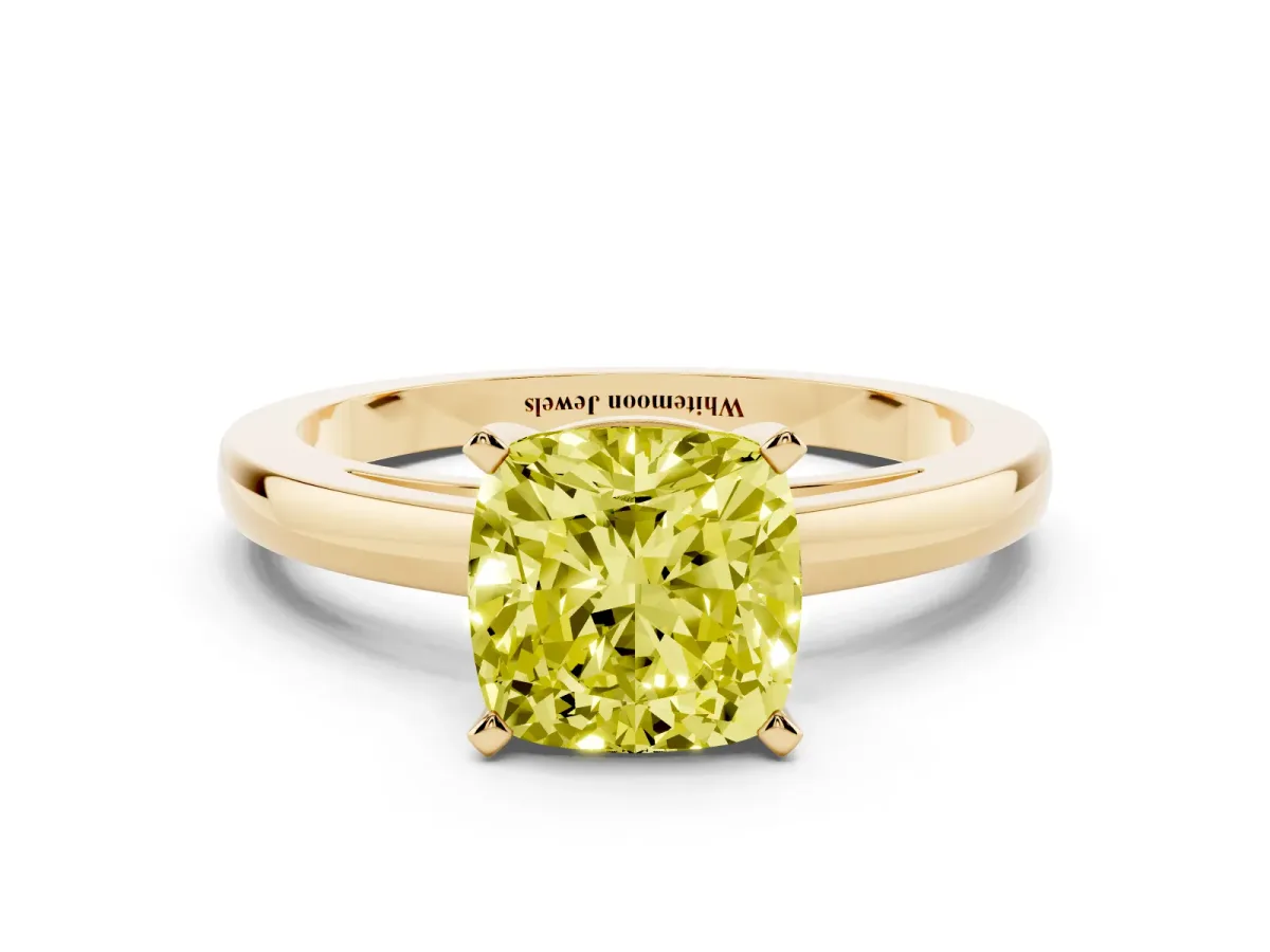 Fancy Yellow Cushion Cut Solitaire Diamond Engagement Ring with Four-Prong Setting on a Classic Band Yellow gold