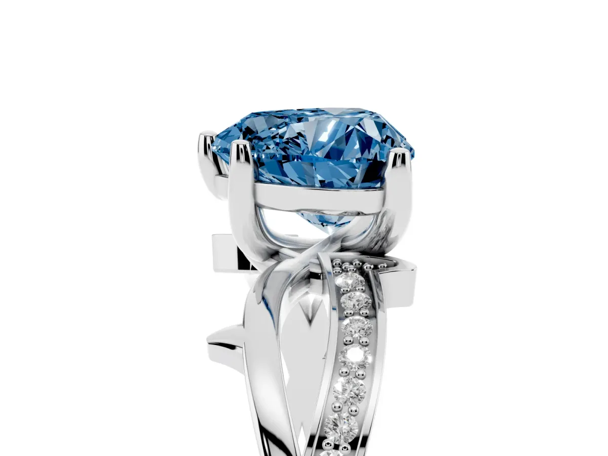 Fancy Blue Heart Cut Solitaire Twist Band with Pavé Accents and Four-Prong Setting Silver
