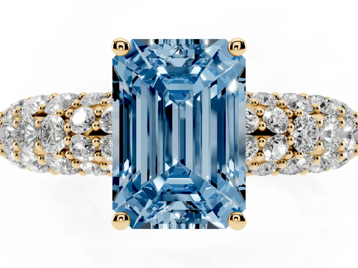 Fancy Blue Emerald Cut Diamond Pavé Band Solitaire Ring with Four-Prong Setting Yellow gold