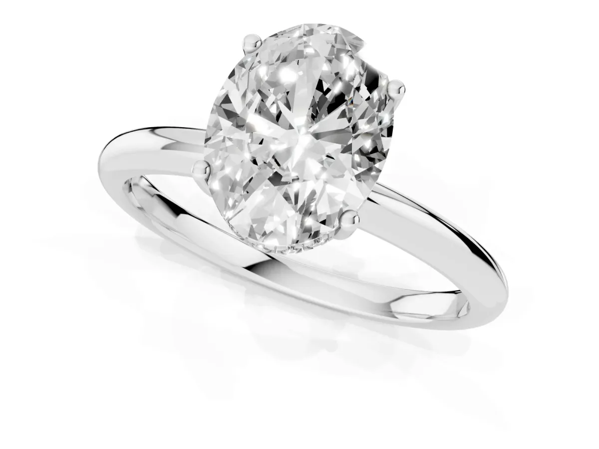 Oval Cut Cut Solitaire Engagement Ring with Four-Prong Setting and Classic Band Silver