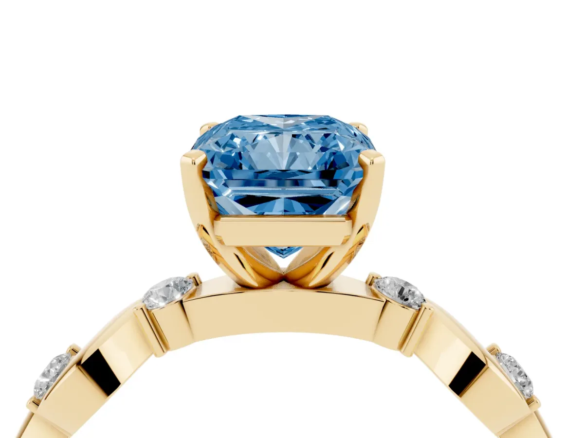 Fancy Blue Radiant Cut Diamond Solitaire Twisted Band with Round Accents and Prong Setting Yellow gold