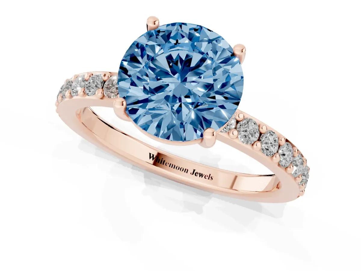 Fancy Blue Round Cut Cut Diamond Solitaire with Pave Band and Four-Prong Setting Rose gold