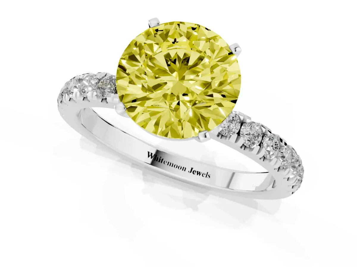 Fancy Yellow Round Cut Diamond Solitaire Ring with Pavé Accents and Four-Prong Setting Silver