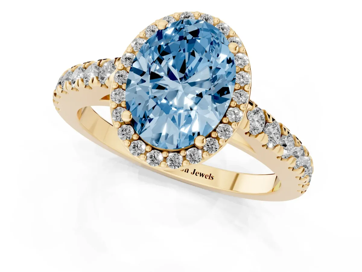 Fancy Blue Oval Cut Cut Halo Diamond Engagement Ring with Pave Band and Four-Prong Setting Yellow gold