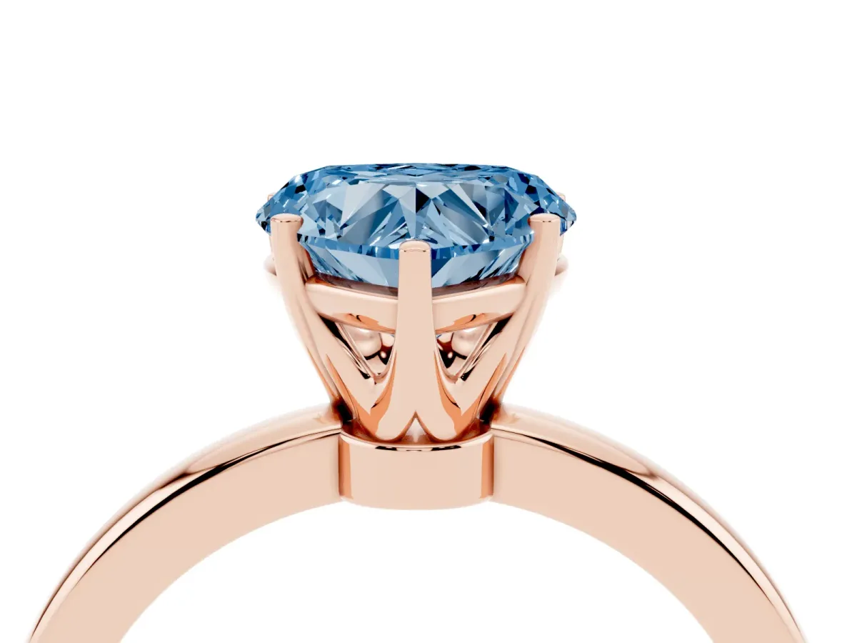 Fancy Blue Heart Cut Solitaire Diamond Ring with Six-Prong Setting on a Classic Band Rose gold