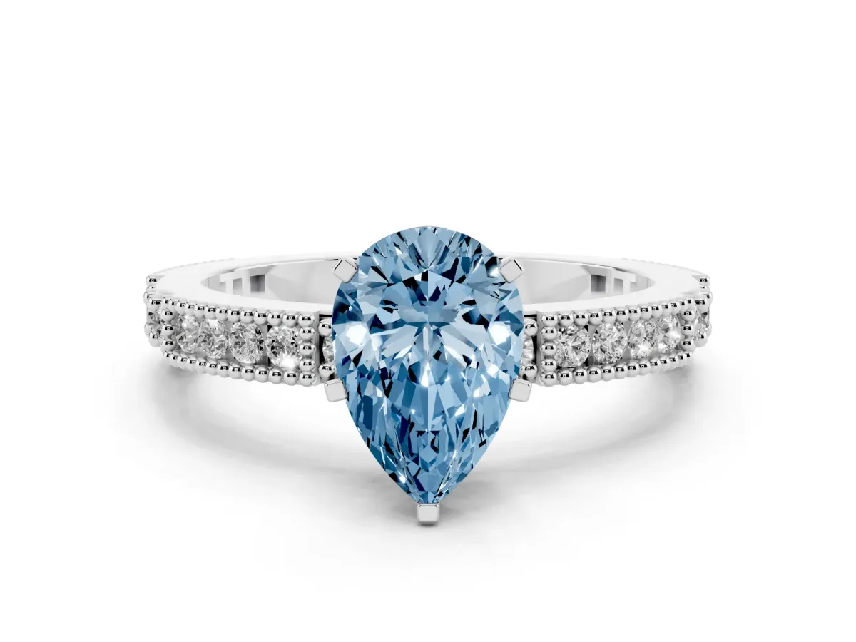 Fancy Blue Pear Cut Solitaire with Pavé Band and Four-Prong Setting Platinum