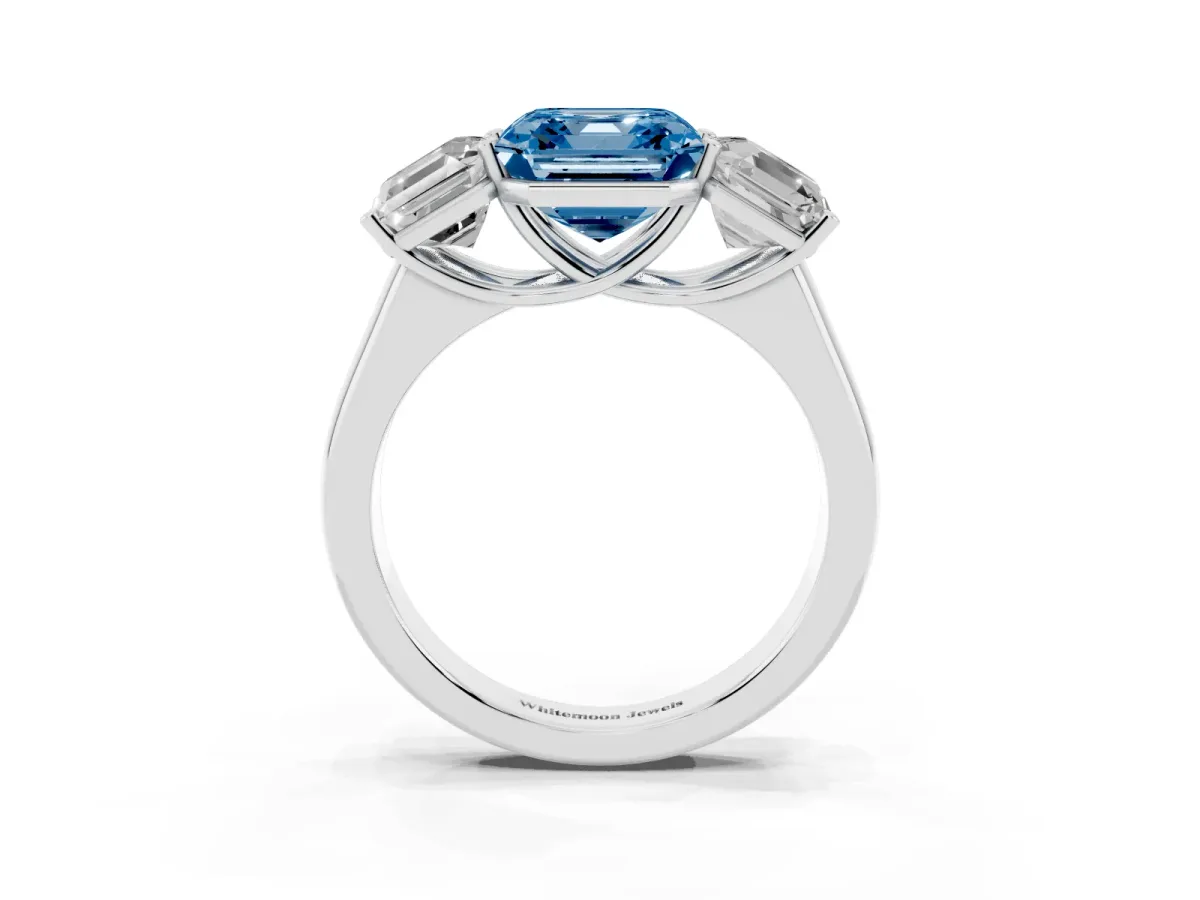 Fancy Blue Asscher Cut Three-Stone Diamond Ring with Prong Setting on a Classic Band White gold