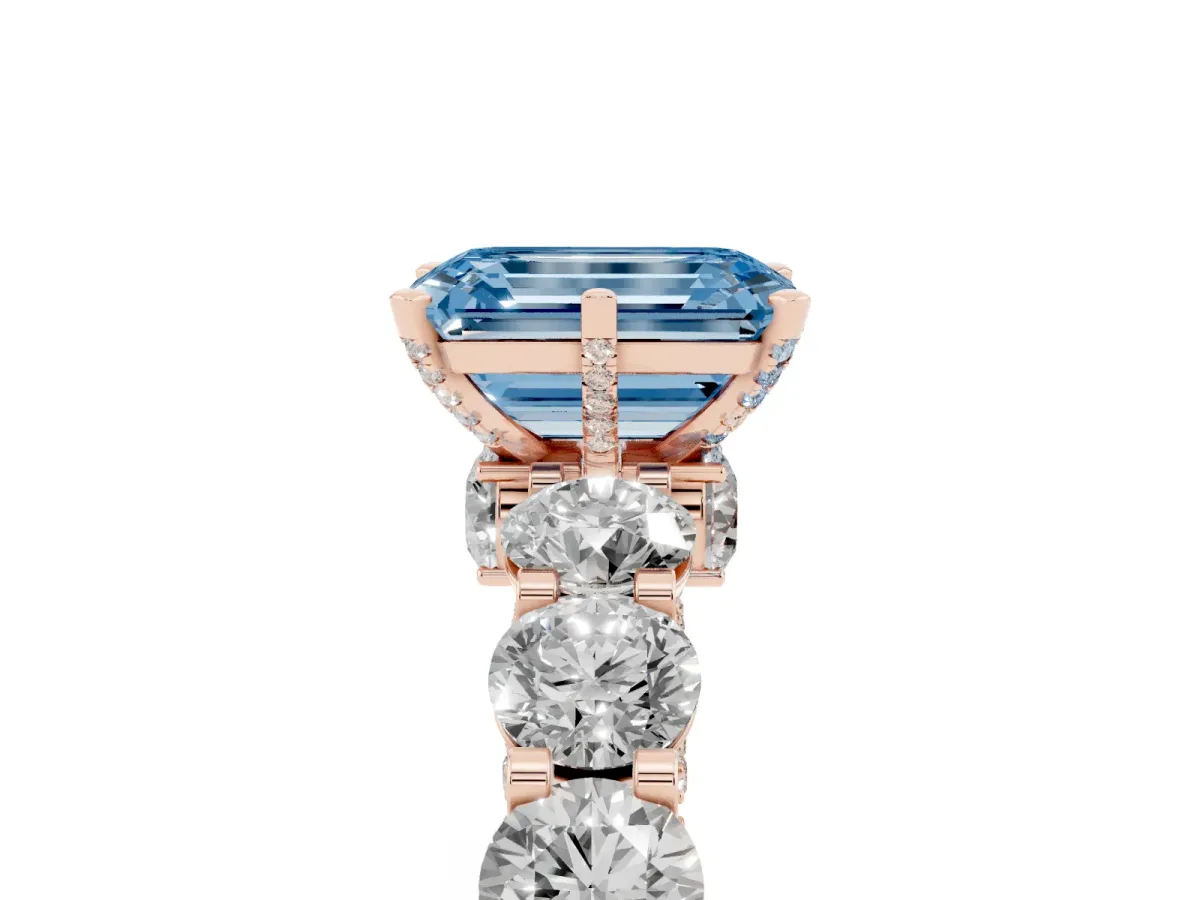 Fancy Blue Emerald Cut Diamond Side Stone Engagement Ring with Four-Prong Setting Rose gold
