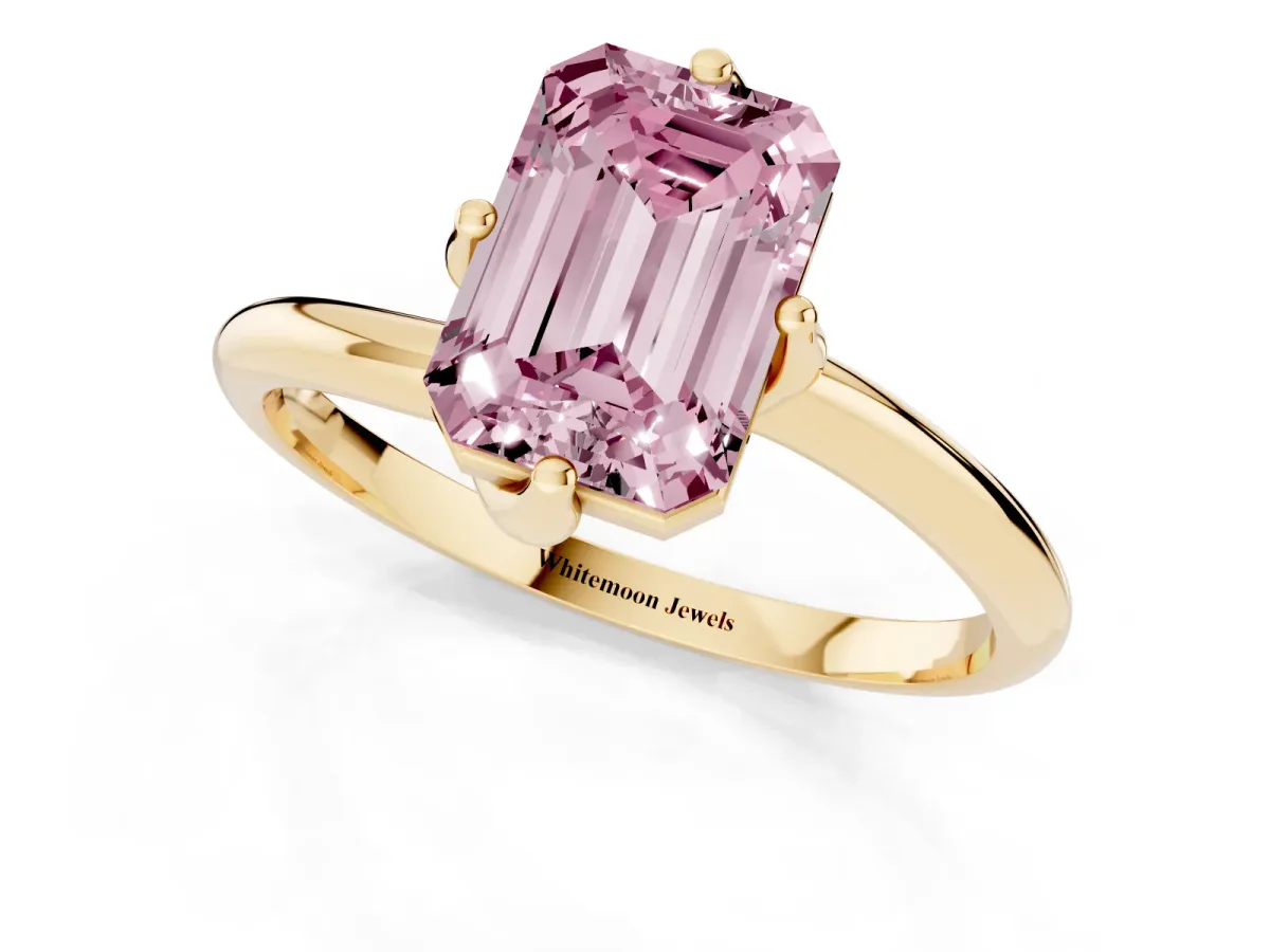 Fancy Pink Emerald Cut Diamond Solitaire Engagement Ring with Four-Prong Setting and Classic Band Yellow gold