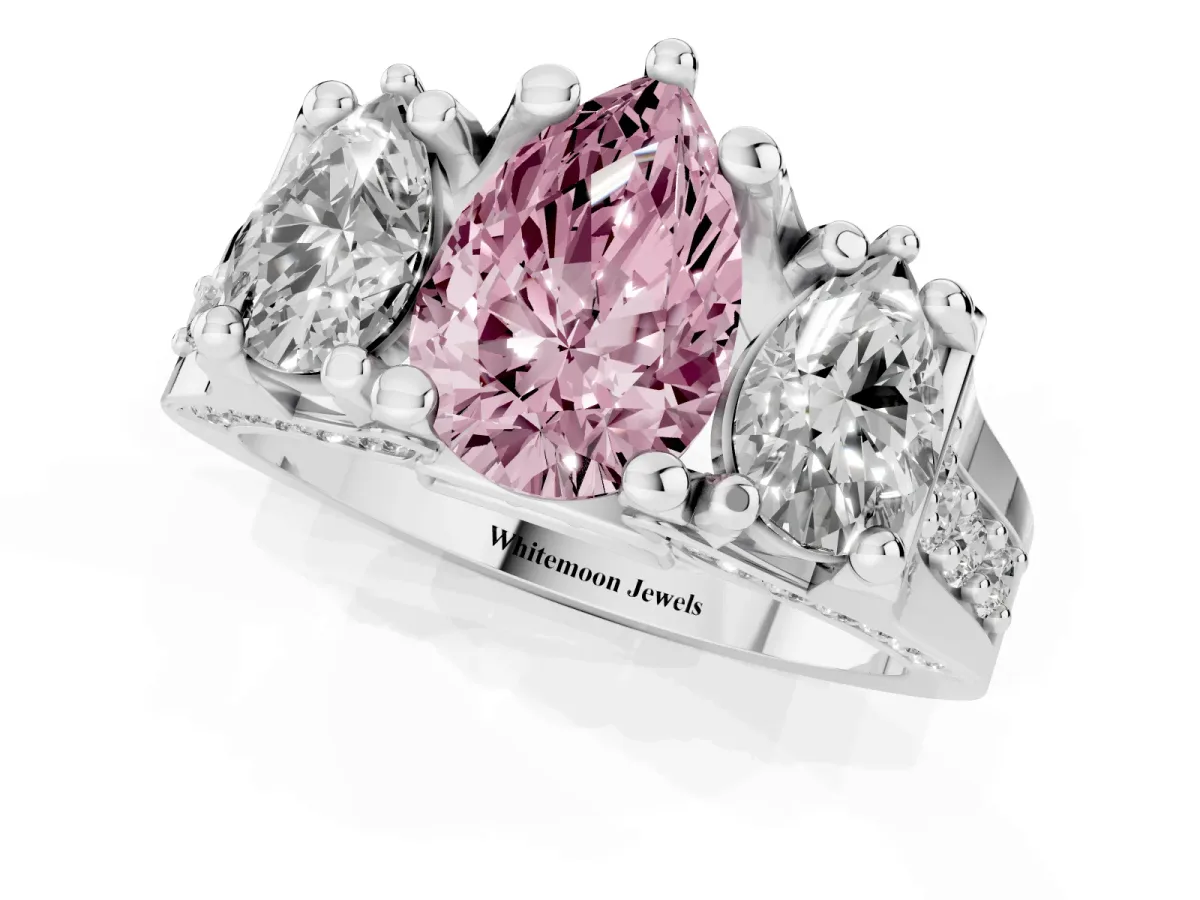 Fancy Pink Pear Cut Diamond Three-Stone Ring with Channel Set Band and Four-Prong Setting Silver