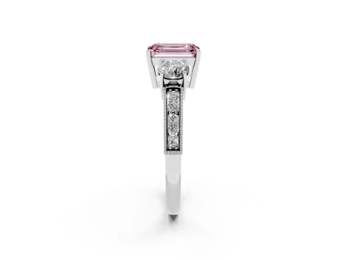 Fancy Pink Emerald Cut Three-Stone Diamond Ring with Pavé Band and Four-Prong Setting Platinum