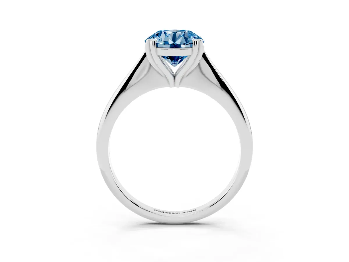 Fancy Blue Round Cut Solitaire Diamond Ring with Six-Prong Setting and Classic Band Silver