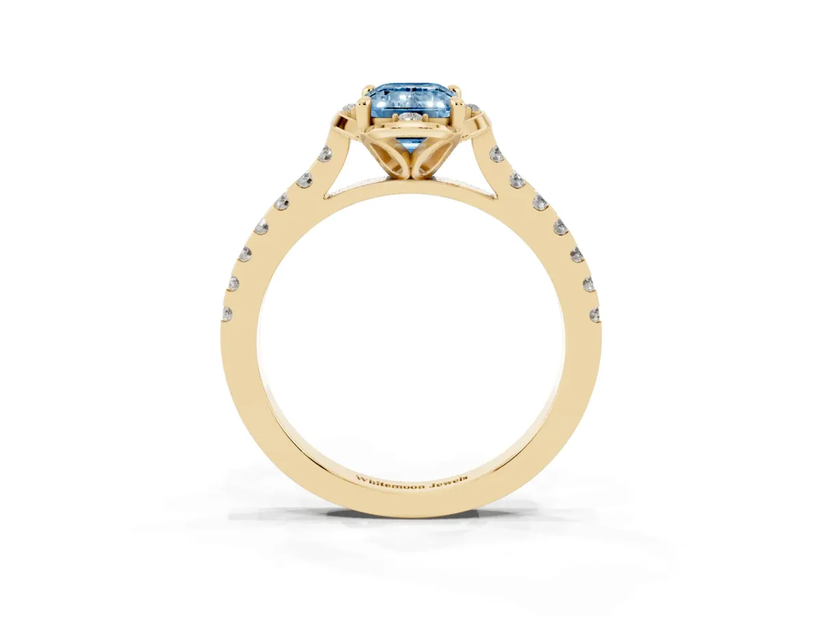 Fancy Blue Emerald Cut Diamond Ring with Pavé Band and Floral Prong Setting Yellow gold