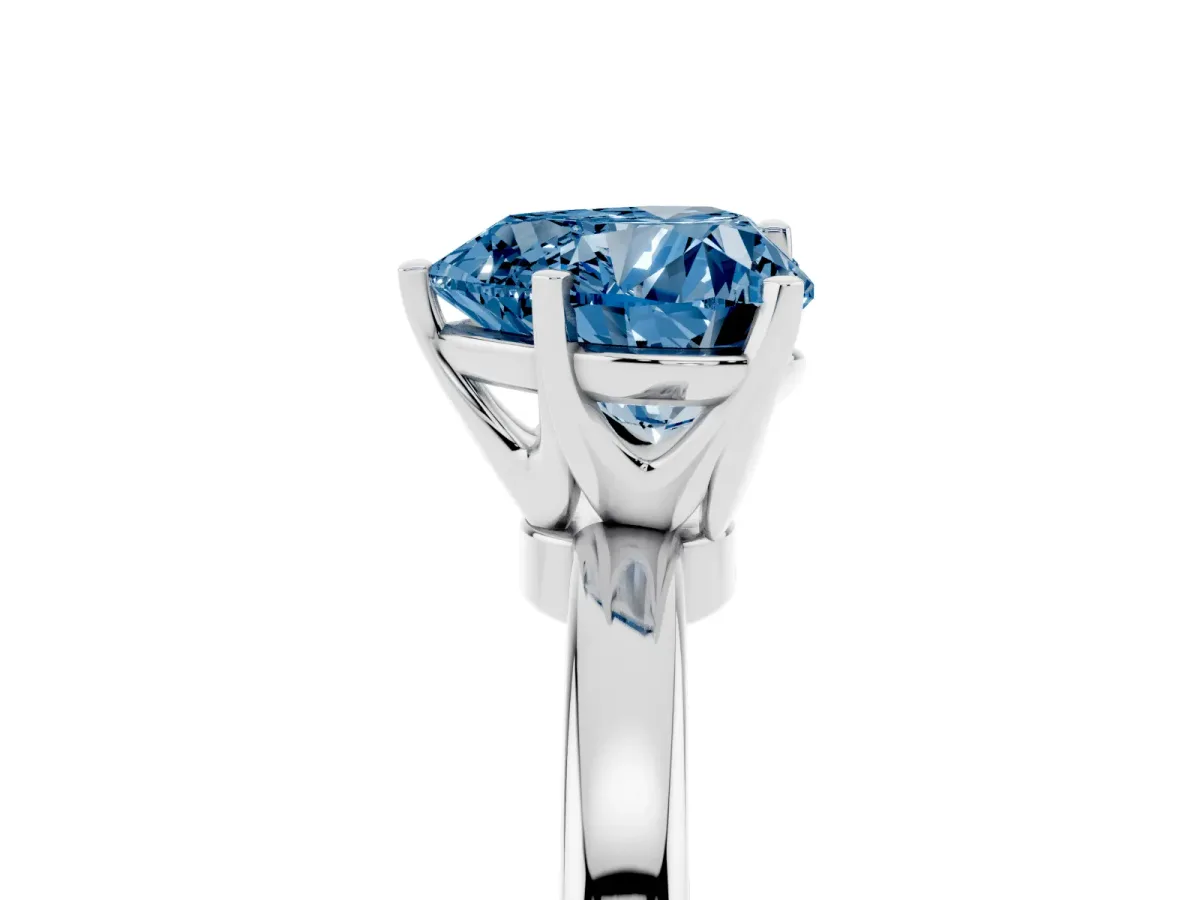 Fancy Blue Heart Cut Solitaire Diamond Ring with Six-Prong Setting on a Classic Band Platinum