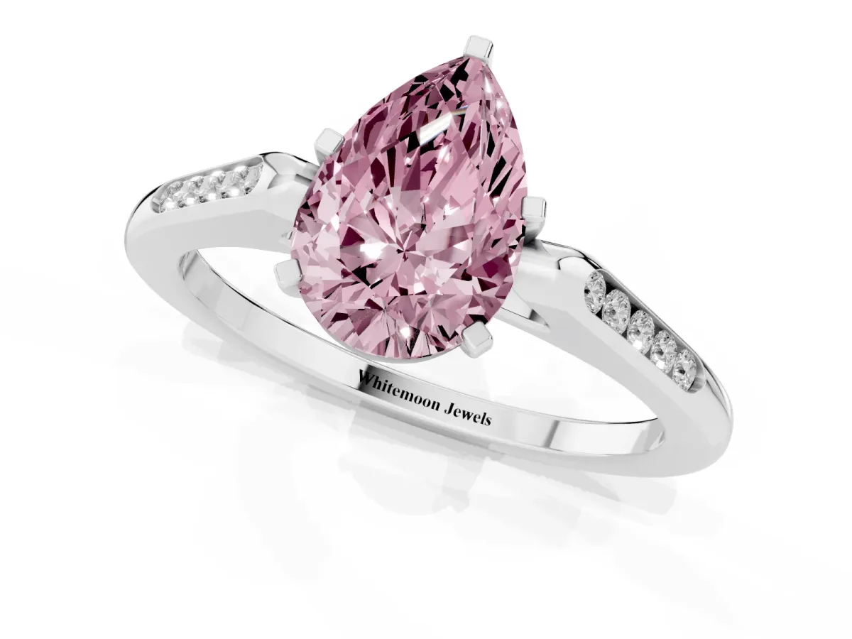 Fancy Pink Pear Cut Diamond Solitaire Ring with Channel Set Round Band and Prong Setting Silver
