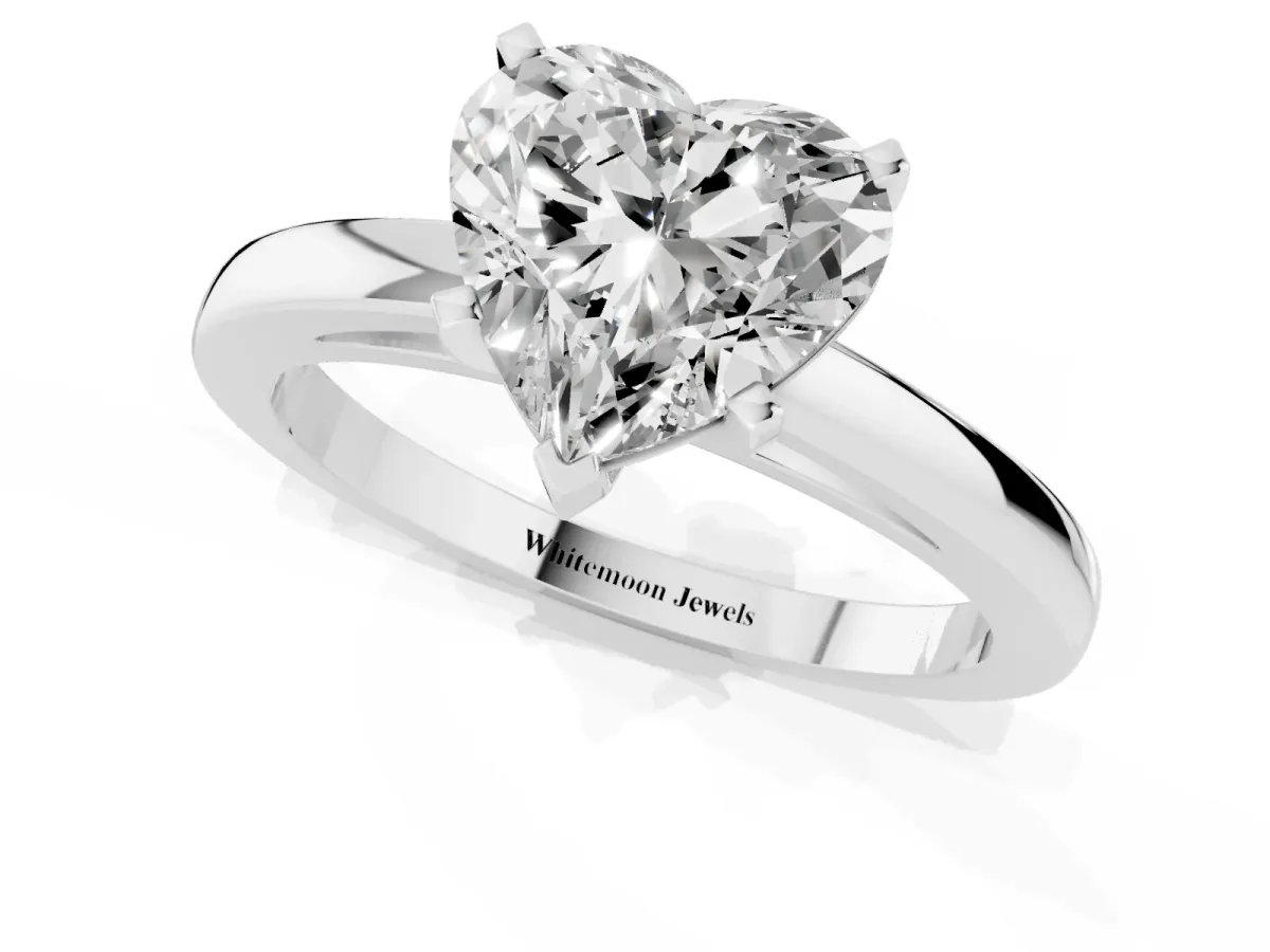 Heart Cut Solitaire Diamond Engagement Ring with Four-Prong Setting on a Classic Band Silver