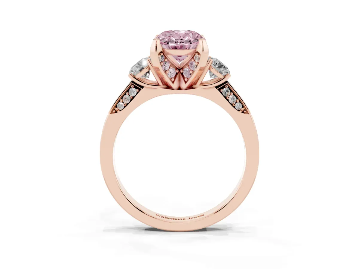 Fancy Pink Oval Cut Brilliant Three-Stone Diamond Ring with Pavé Band and Four-Prong Setting Rose gold