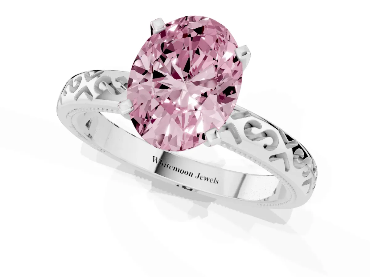 Fancy Pink Oval Cut Solitaire Engagement Ring with Scrollwork Band and Four-Prong Setting Silver