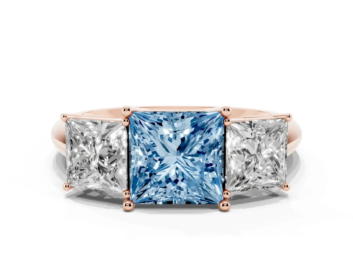Fancy Blue Three-Stone Princess Cut Cut Diamond Engagement Ring with Prong Setting on a White Gold Band Rose gold