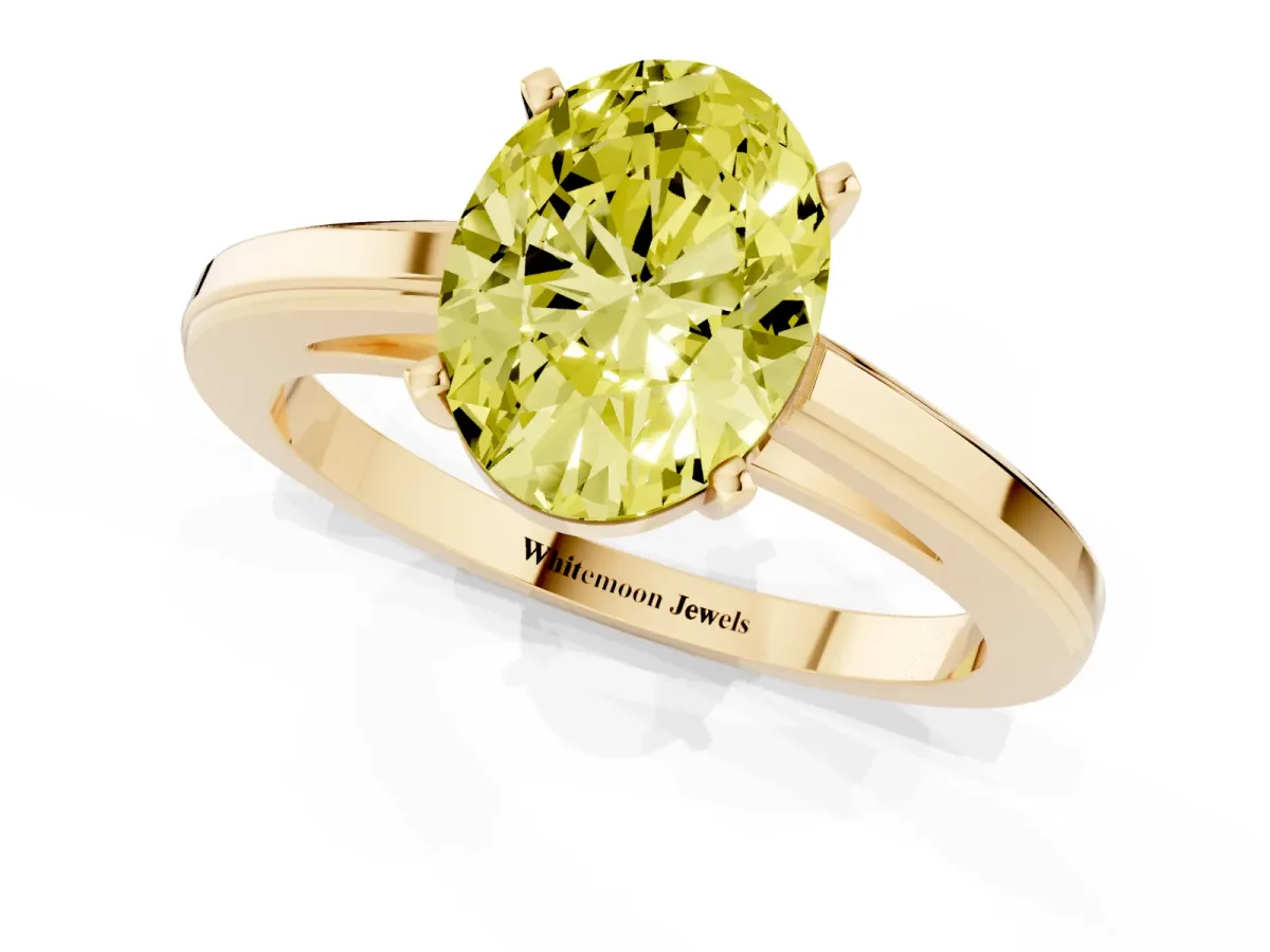 Fancy Yellow Oval Cut Solitaire Diamond Ring with Four-Prong Setting and Classic Band Yellow gold