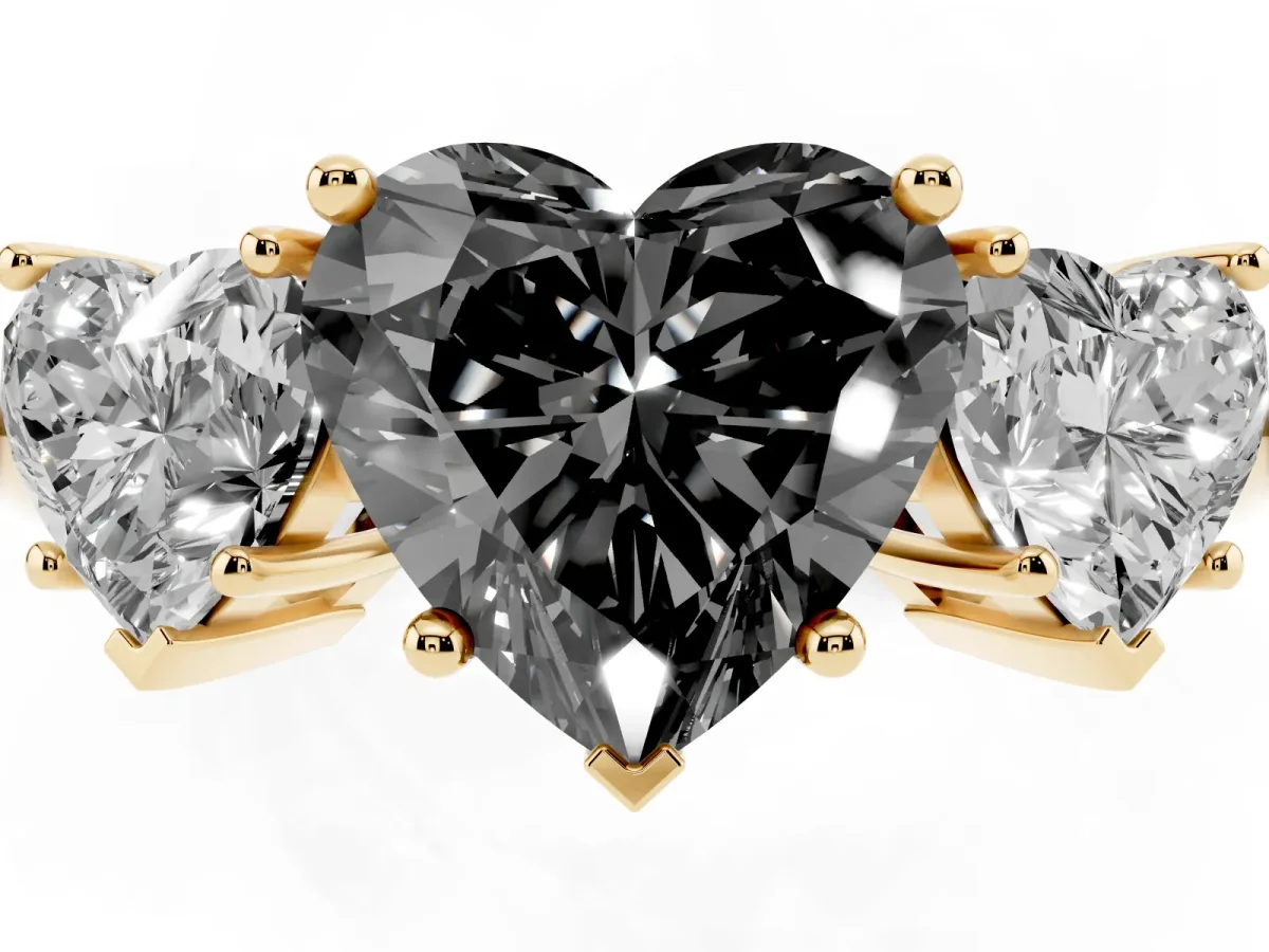 Fancy Black Three-Stone Heart Cut Cut Diamond Engagement Ring with Prong Setting on a White Gold Band Yellow gold