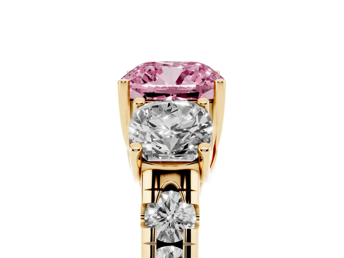 Fancy Pink Three-Stone Cushion Cut Diamond Pavé Band with Prong Setting Yellow gold