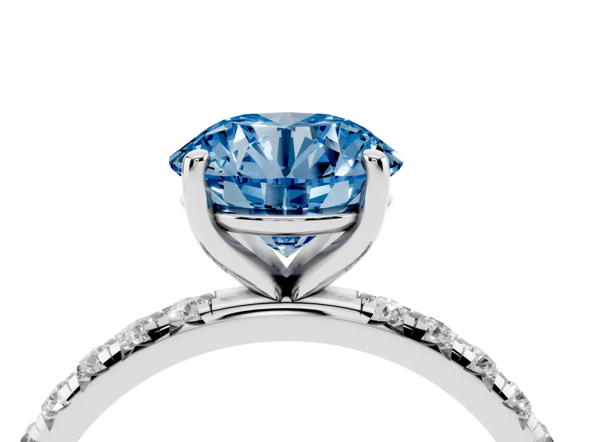 Fancy Blue Round Cut Cut Diamond Solitaire Ring with Micro Pave Band and Four Prong Setting Platinum