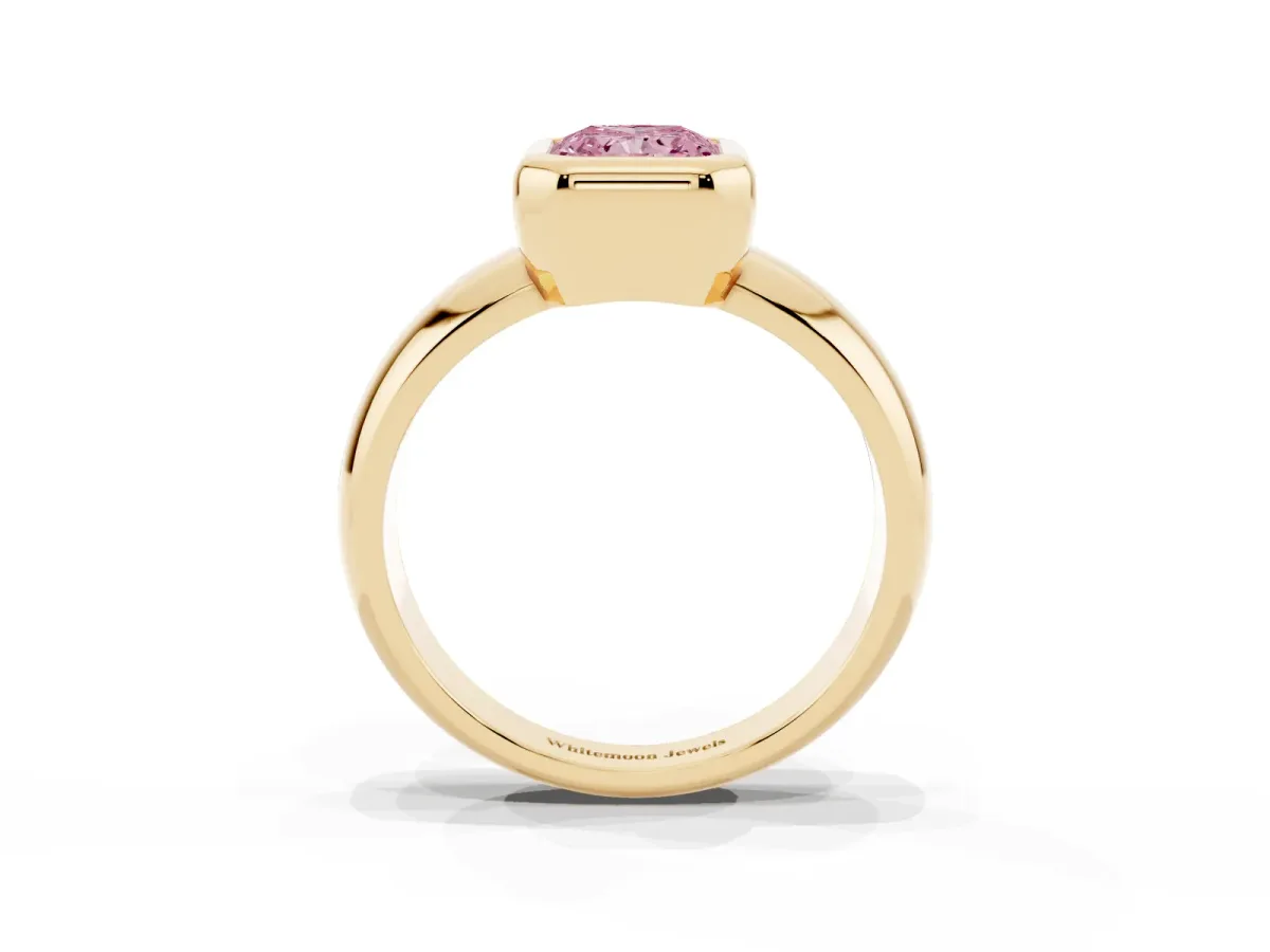 Fancy Pink Bezel Set Radiant Cut Solitaire Ring with Wide Band Yellow gold