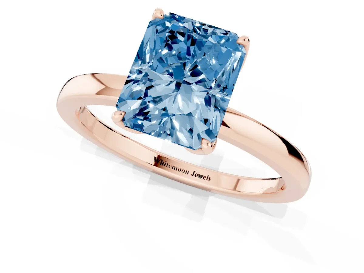 Fancy Blue Radiant Cut Diamond Solitaire Ring with Thin Band and Prong Setting Rose gold