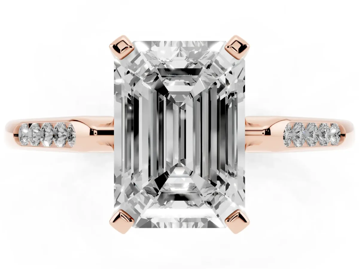 Emerald Cut Diamond Solitaire Ring with Channel Set Round Band and Prong Setting Rose gold