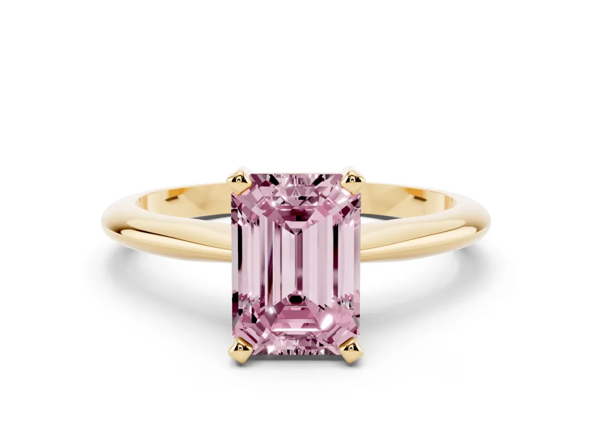 Fancy Pink Emerald Cut Cut Solitaire Ring with Four-Prong Setting on a Classic Band Yellow gold