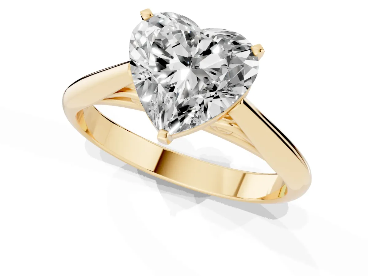 Heart Cut Diamond Solitaire Engagement Ring with Cathedral Setting and Four-Prong Mount Yellow gold
