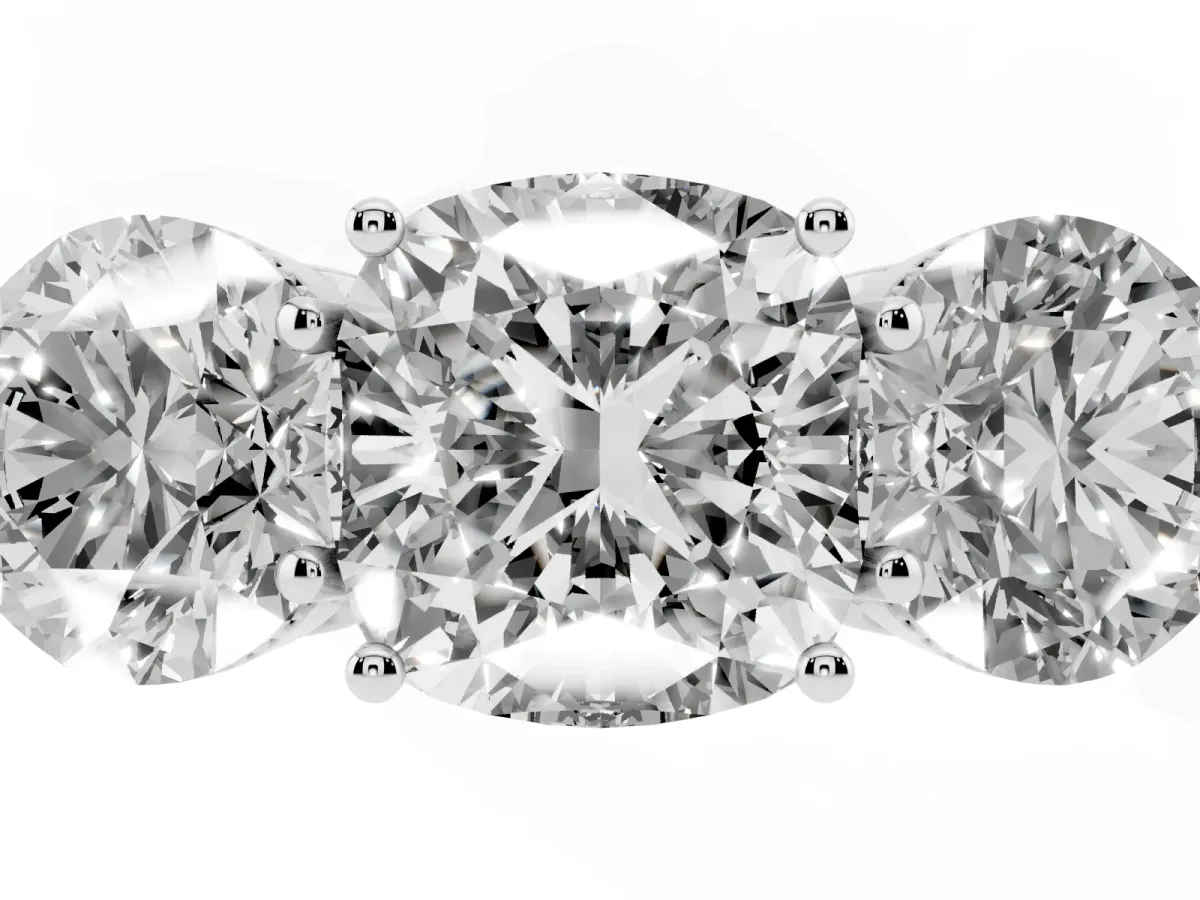 Three-Stone Cushion Cut Diamond Engagement Ring with Prong Setting on a Classic Band Silver