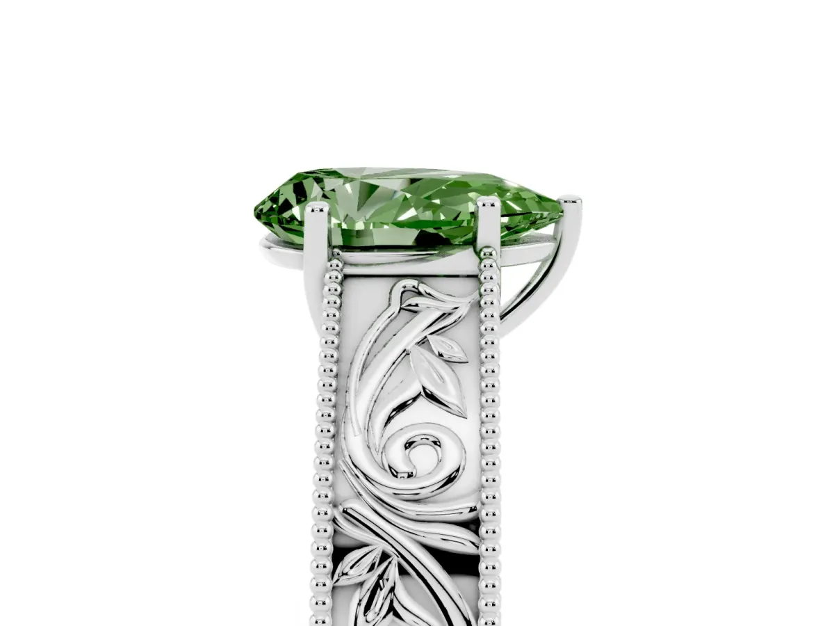 Fancy Green Pear Cut Diamond Solitaire Ring with Engraved Band and Four-Prong Setting Silver