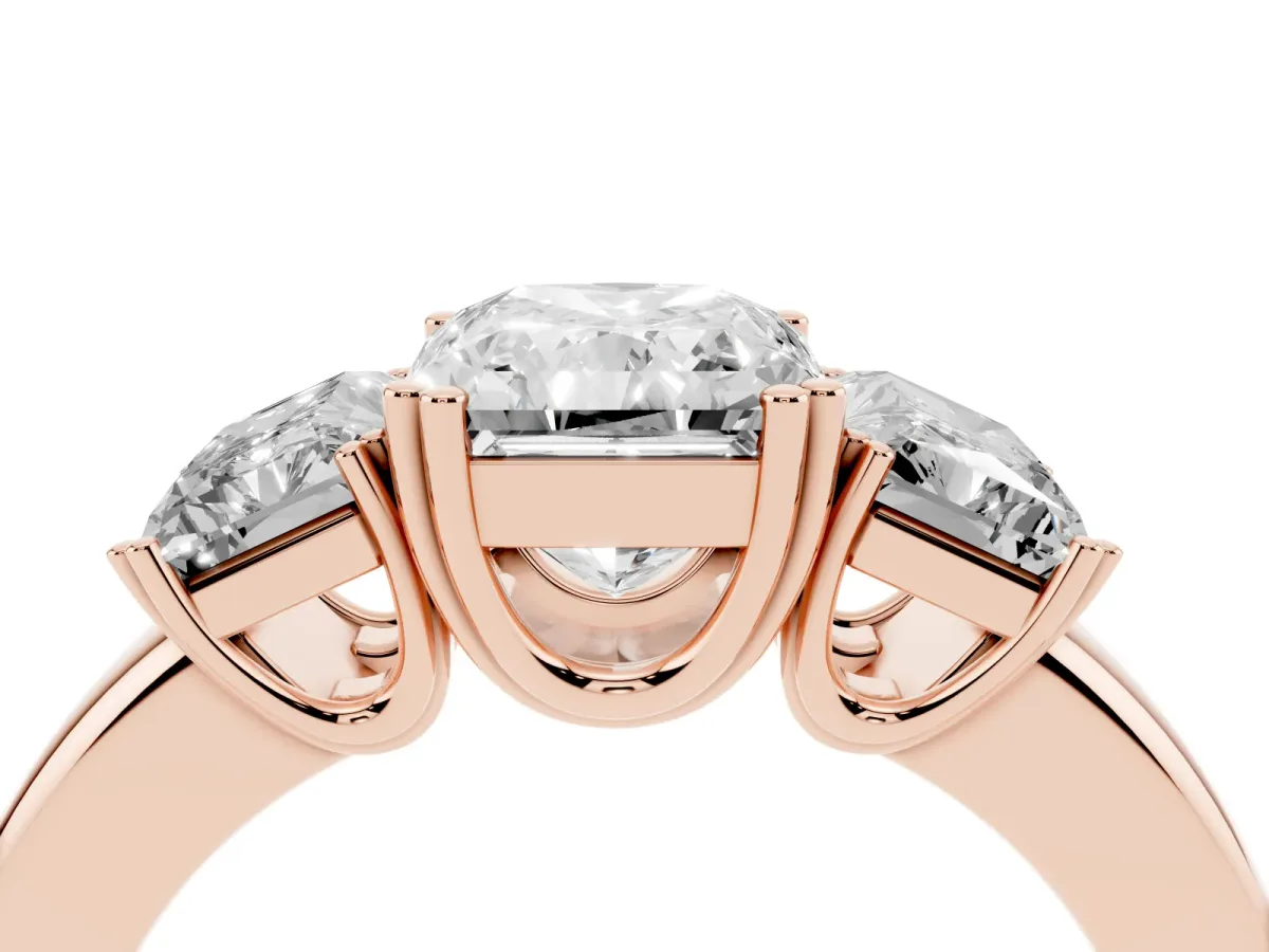Three-Stone Radiant Cut Cut Diamond Ring with Channel Set Band and Four-Prong Setting Rose gold