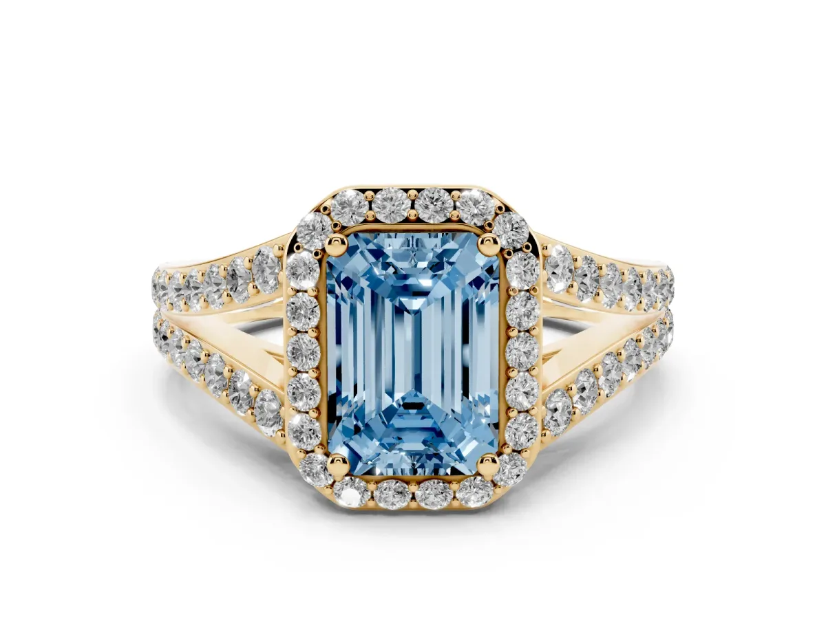 Fancy Blue Emerald Cut Diamond Split Shank Halo Ring with Four-Prong Setting Yellow gold