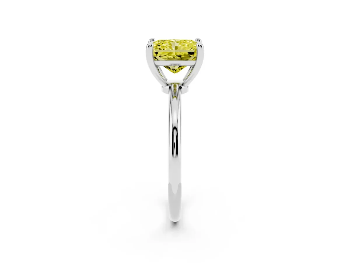 Fancy Yellow Radiant Cut Solitaire Diamond Ring with 4-Prong Setting on a Classic Band Platinum