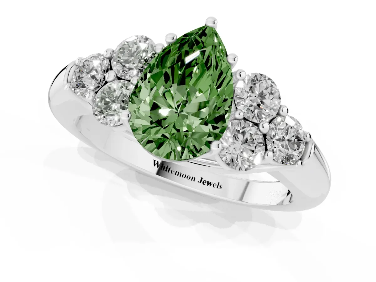 Fancy Green Pear Cut Cut Diamond Cluster Ring with Round Accent Stones and Prong Setting on a Classic Band White gold