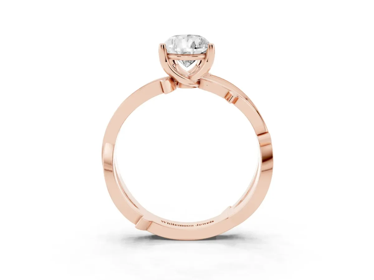 Pear Cut Solitaire Twist Band with Pavé Accents and Four-Prong Setting Rose gold