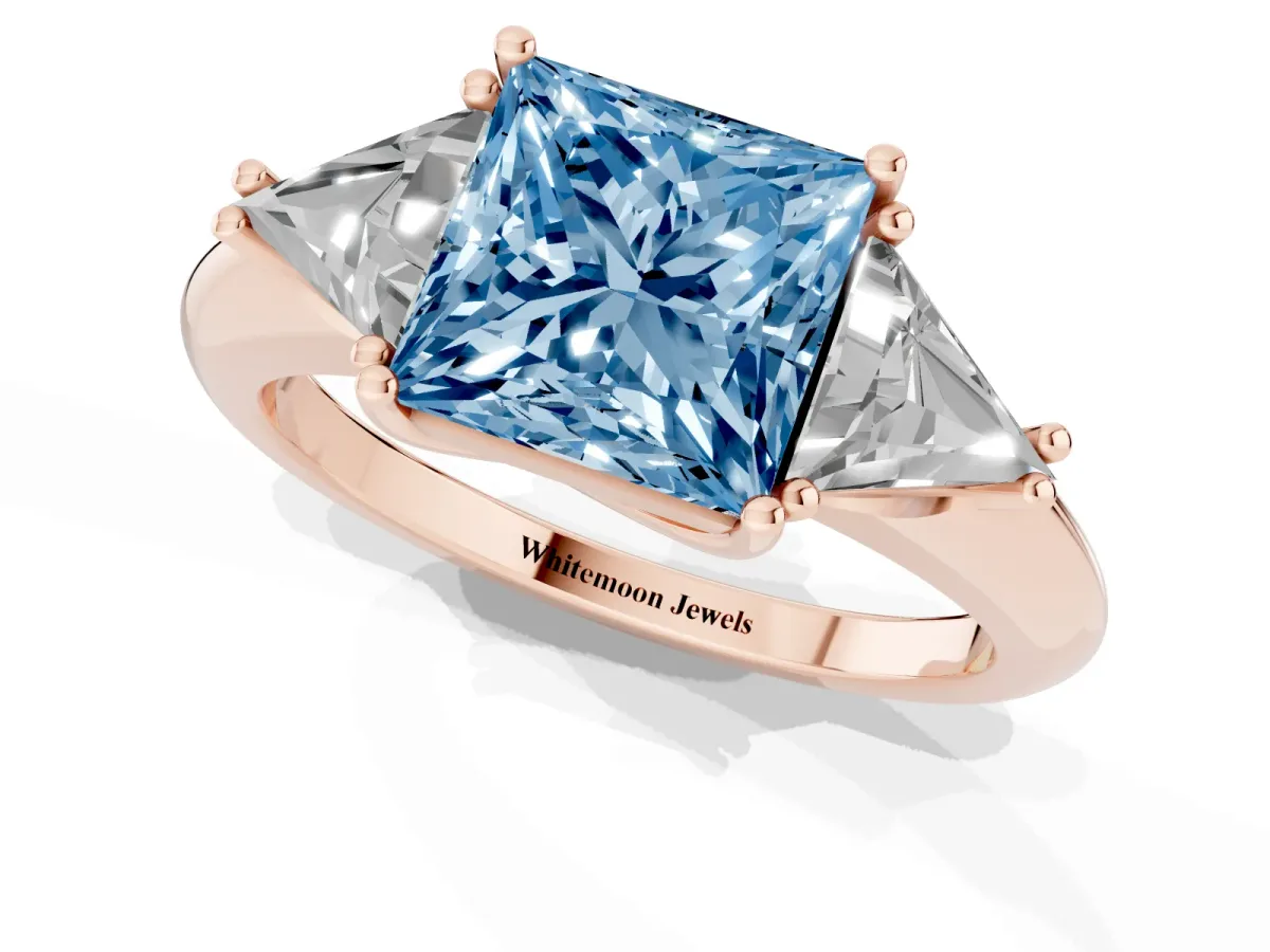 Fancy Blue Three-Stone Princess Cut Diamond Engagement Ring with Trillion Side Stones and Prong Setting Rose gold