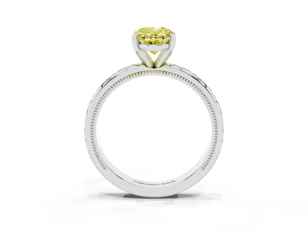 Fancy Yellow Oval Cut Solitaire Engagement Ring with Scrollwork Band and Four-Prong Setting Silver