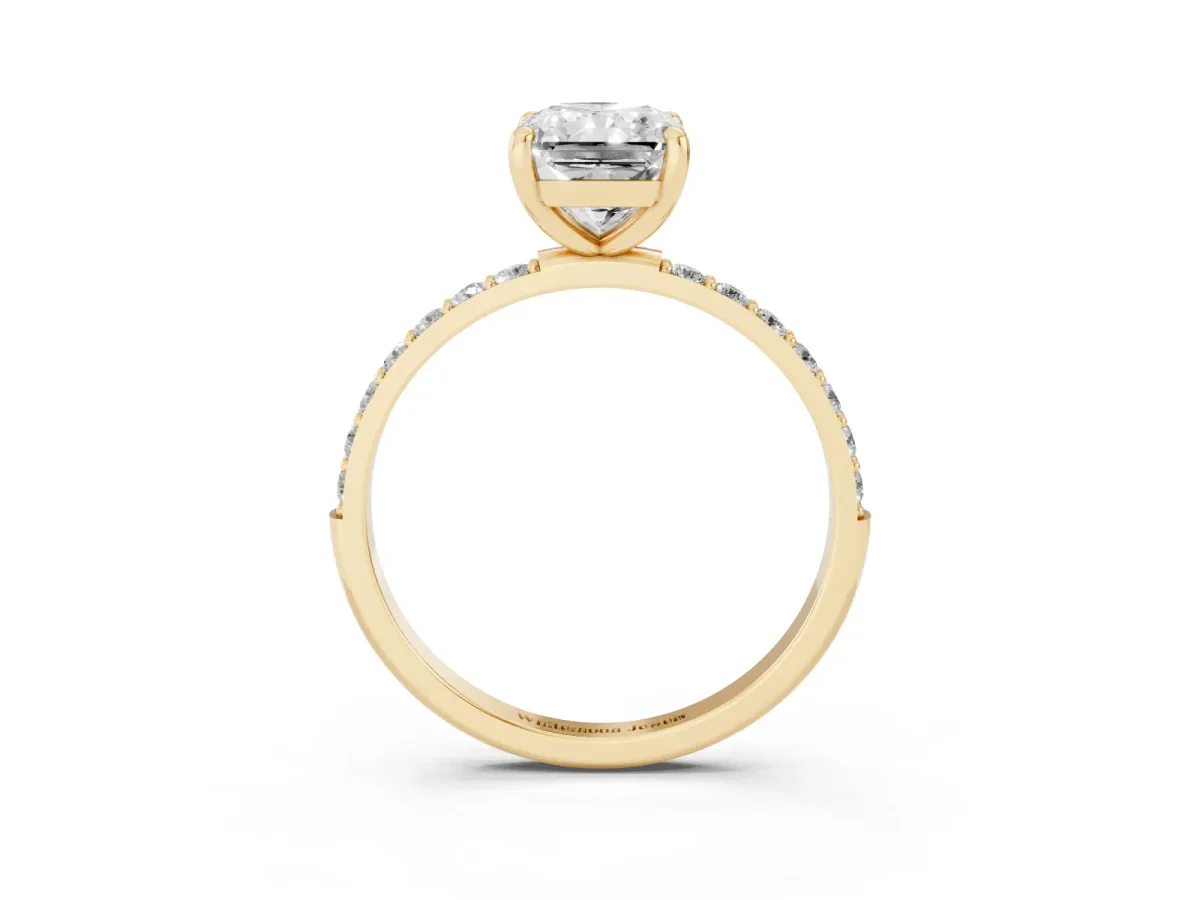 Radiant Cut Diamond Solitaire Ring with Round Pavé Band and Prong Setting Yellow gold