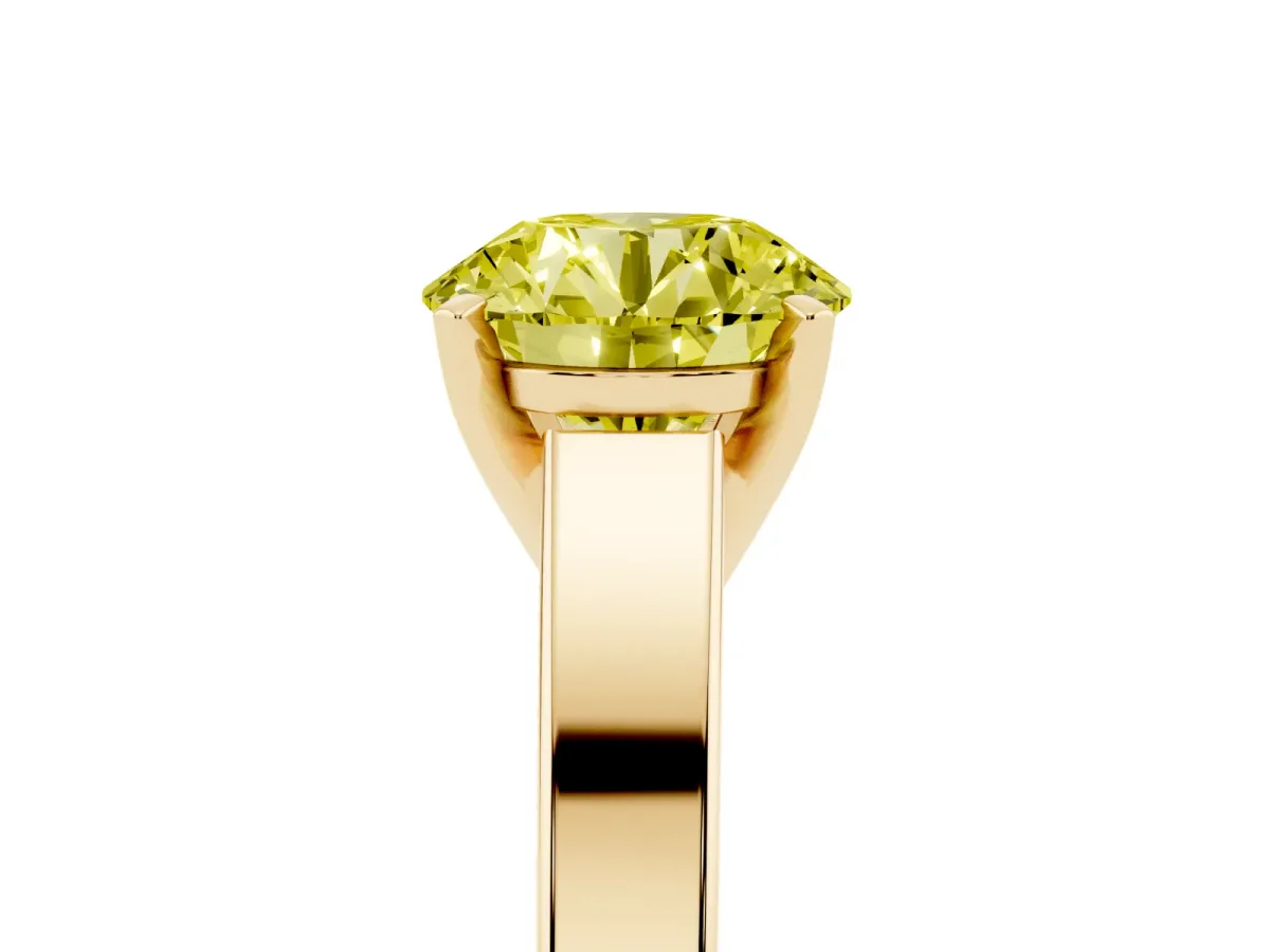 Fancy Yellow Round Cut Solitaire Engagement Ring with Four-Prong Setting and Tapered Band Yellow gold